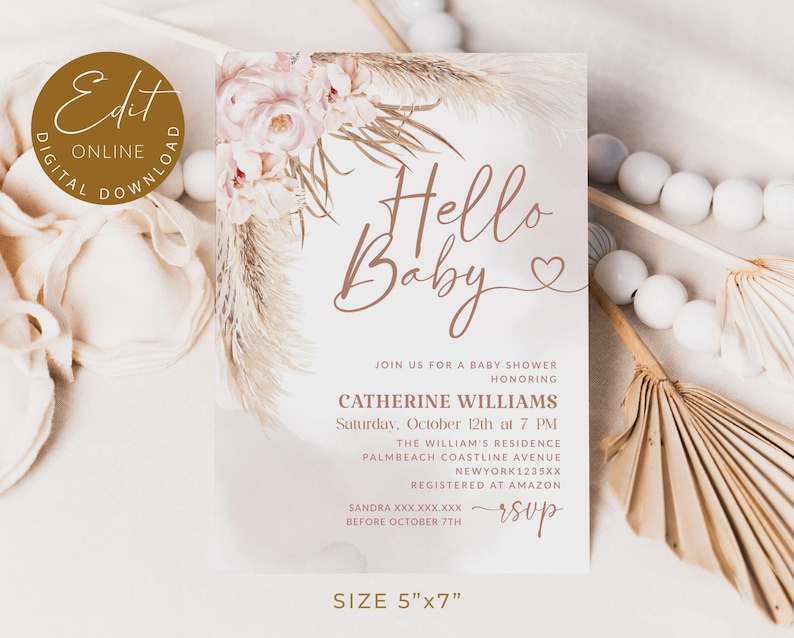 May include: A baby shower invitation with the text "Hello Baby" in a delicate script font. The design features floral and pampas grass accents in soft pink and beige tones. The invitation measures 5"x7".
