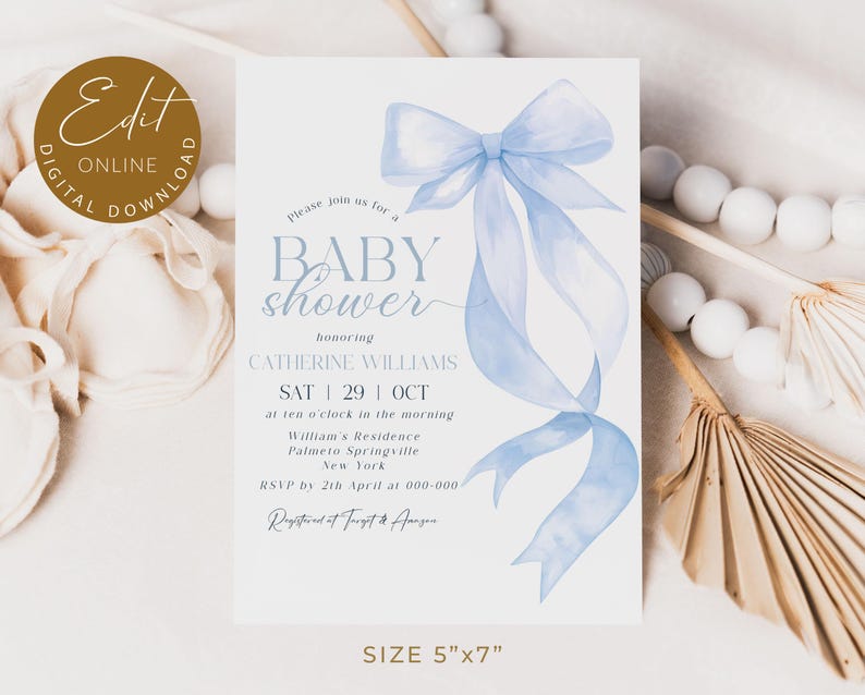 May include: A baby shower invitation with a light blue watercolor bow and ribbons. The invitation includes the text "Baby Shower" and event details. The card measures 5" x 7".