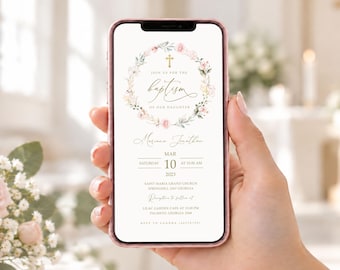 May include: A smartphone displaying a digital baptism invitation for a daughter. The design features a floral wreath with a gold cross, the text "JOIN US FOR THE BAPTISM OF OUR DAUGHTER," and event details including the name Marianna Jonathan, date, and location.