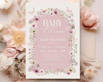 May include: A baby shower invitation with a pink background and floral accents. The text reads "BABY in Bloom" and includes details for the event, such as the date, time, and honoree's name. The invitation is surrounded by a floral border with butterflies.