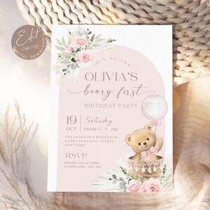 Pink floral first birthday invitation featuring a teddy bear in a basket, pastel flowers, and a balloon for a baby girl's Beary First birthday party