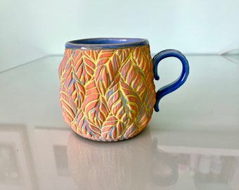 Orange Leaves Coffee Cup