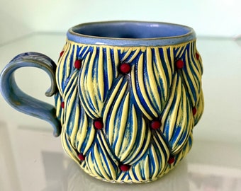 Yellow Cup With Red Polkadots