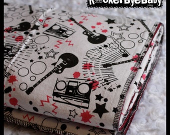 RockerByeBasics Baby or Toddler Blanket Black PInk Black and White Stars Guitars and Boom boxes with hot pink flannel girls 36x42