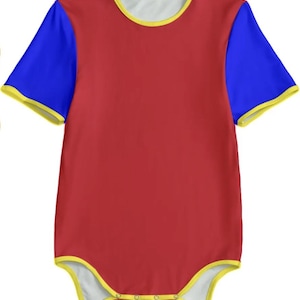 May include: Red baby onesie with blue short sleeves and yellow trim. The onesie has snaps at the bottom.
