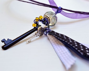 Black Polka Dot Key Skeleton Pendant . Purple wire wrapped pendant. Free Ribbon Necklace.