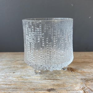 May include: A rustic wooden sign with the text "Welcome to our home" in white lettering. The sign features a distressed finish and a simple, inviting design, perfect for entryway decor.