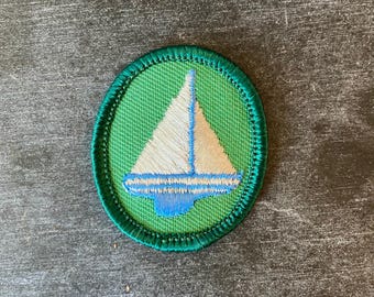 1960- och 1970-talens flickscouttruppsvapenmärken - Singlar - Segelbåtsvapen