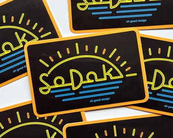 SoDak Neon Sun Sticker by Oh Geez! Design - South Dakota Neon Sun Decal - South Dakota Gift