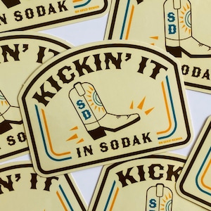 Kickin&#39; It in SoDak Sticker by Oh Geez! Design - South Dakota Cowboy Boot Western Sticker - Retro South Dakota Decal