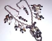 Skull Necklace and Pierced Earrings OOAK Moveable jaw bone ,mixed media assemblage SET