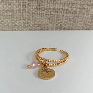 Anillo con colgante de perla rosa y estrella, color dorado, ajustable, de acero inoxidable.