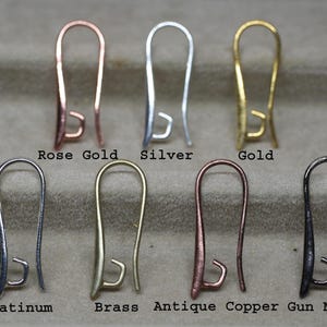May include: A set of 8 earring hooks in different metal finishes: rose gold, silver, gold, platinum, brass, antique copper, and gun metal.
