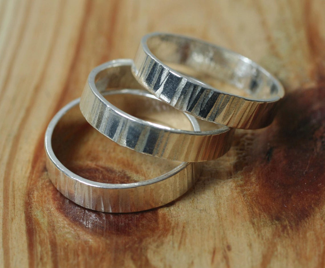 we took our beloved hand hammered band and made it... Hand Hammered Ring, Select Your Color, Size, Surface Texture and ...