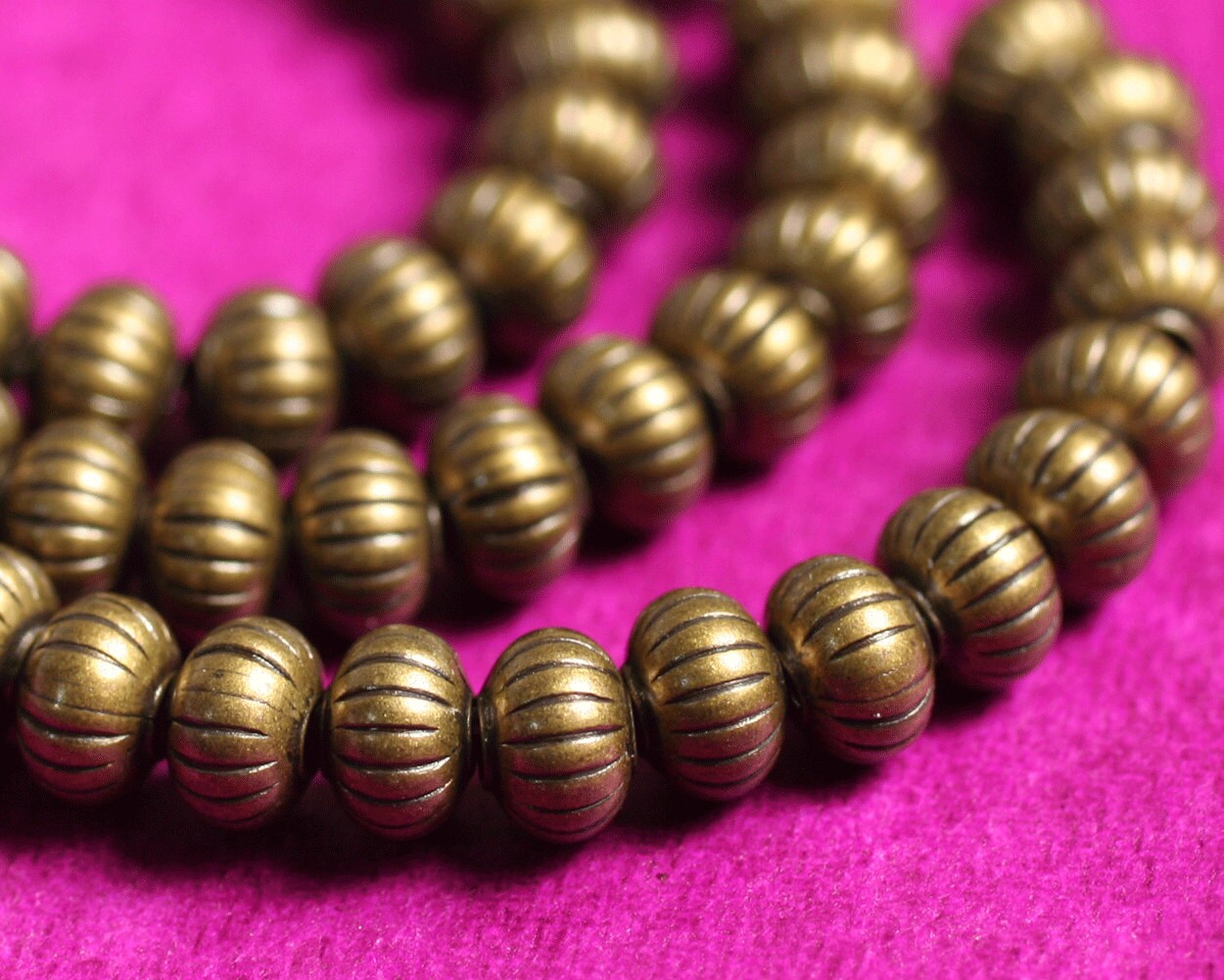 Antique brass corrugated rondelle 4.5x3mm, 40 pcs (item ID F8225MB)