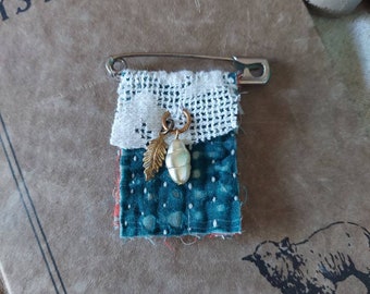 Textile art brooch, teal, pearl, charm, vintage style, unique brooch, vintage button, prayer flag pin, good luck charm