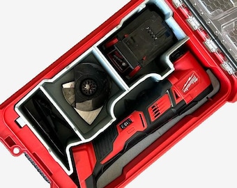 May include: A red Milwaukee tool case with a gray foam insert. The case contains a Milwaukee multi-tool, a battery, and a cutting blade.
