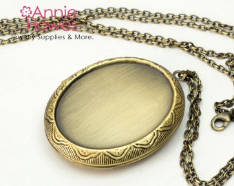 Oval Cameo Locket in Vintage Gold with optional matching glass and 30" link chain. Image area is 30x40