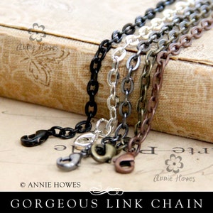 25 Link Chains with Lobster Clasp. Available in Vintage Copper, Vintage Gold, Black, and Silver. 24" Length.