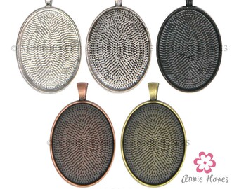 30mm x 40mm Oval pendant settings blanks to use with 30x40 Glamour FX Glass Cabochons. Silver, Gold, Copper, and Black Options. 25 Pack