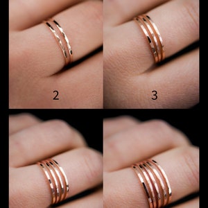 K&ouml;nnte beinhalten: Auf einem Finger werden ros&eacute;goldene Ringe mit geh&auml;mmerten Strukturen gezeigt. Das Bild zeigt Variationen mit zwei, drei, vier und f&uuml;nf Ringen. Die Zahlen 2, 3, 4 und 5 sind im Bild zu sehen.