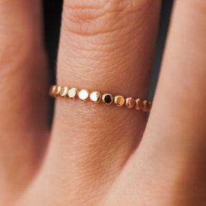 Ring with shop sizing beads