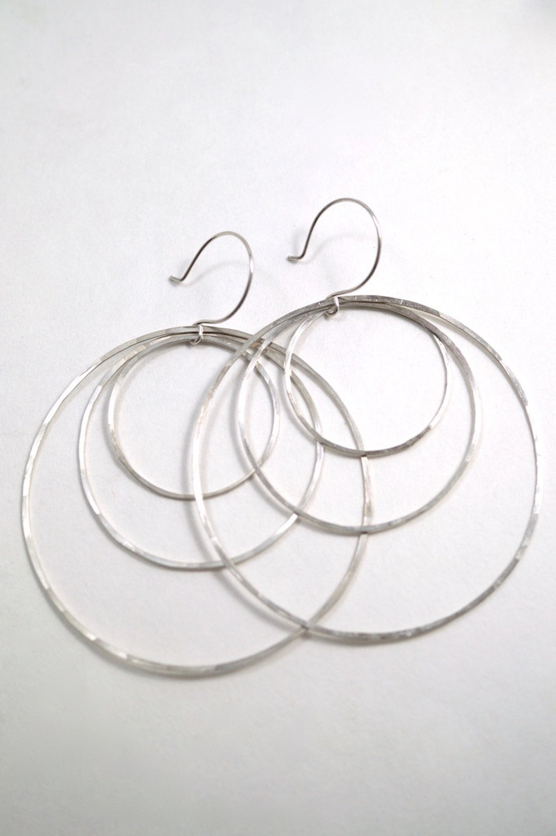 Triple Silver Half Hoop Earrings main image 0