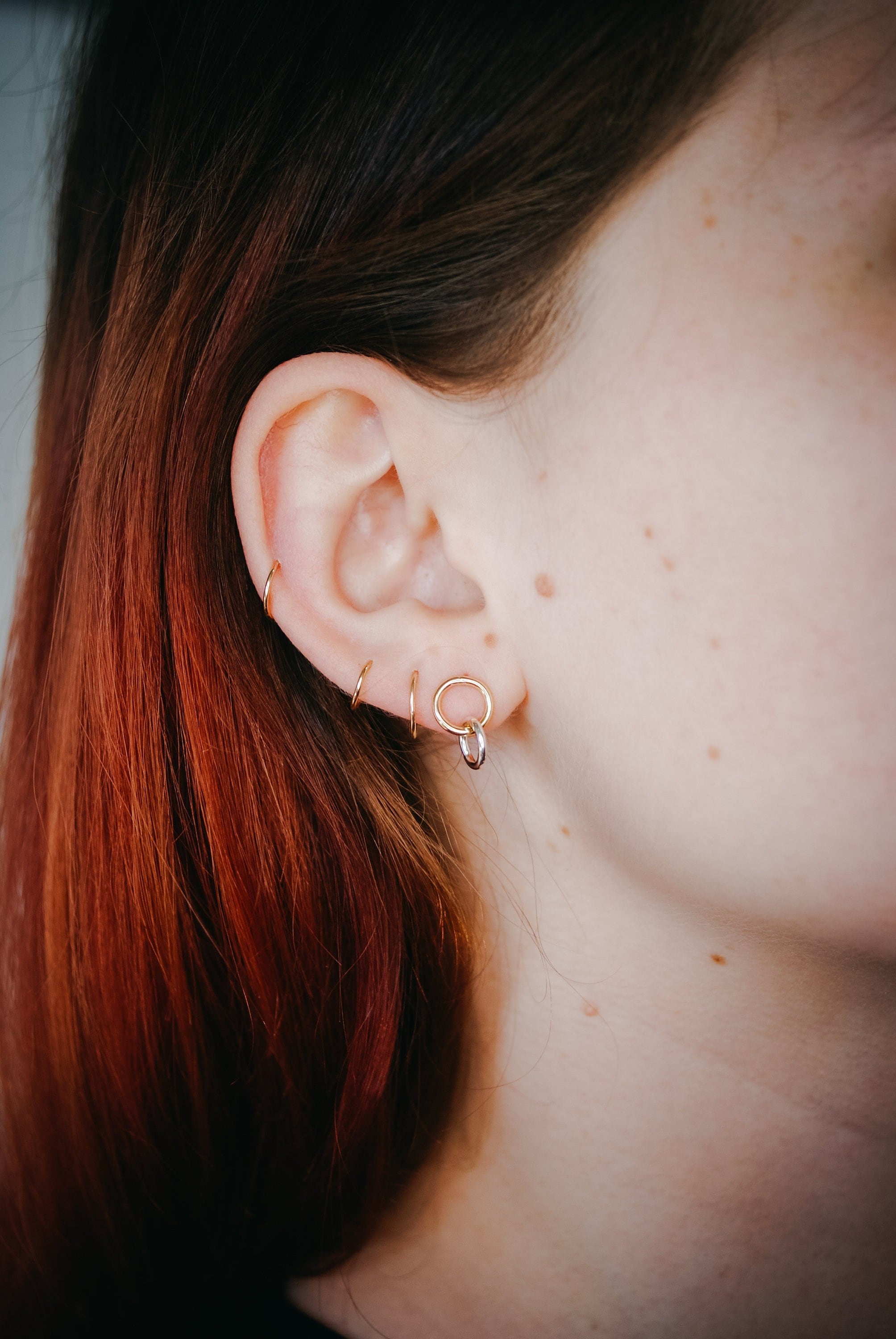 Arresting mixed metal stud earrings