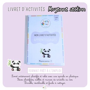 Peut inclure: Un livret d'activités à spirale avec le texte "LIVRET D'ACTIVITÉS Moyenne section" et "MON LIVRET D'ACTIVITÉS APPRENTISSAGES". La couverture présente un panda tenant du bambou et le texte "3 ANS ET.". Le livre est intitulé "Moyenne section - 1".