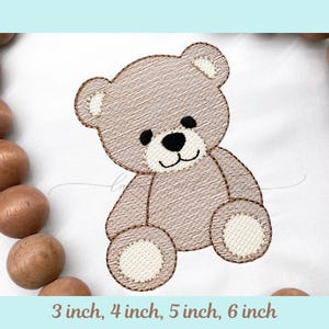 May include: Embroidered teddy bear design in shades of brown and cream, with black eyes and a stitched outline. The text at the bottom reads "3 inch, 4 inch, 5 inch, 6 inch".