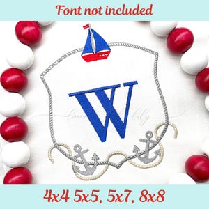 May include: Embroidered nautical design with a blue sailboat and the letter "W" in blue. The design is framed by a rope border and includes anchors. Text at the top reads "Font not included" and at the bottom "4x4 5x5, 5x7, 8x8".