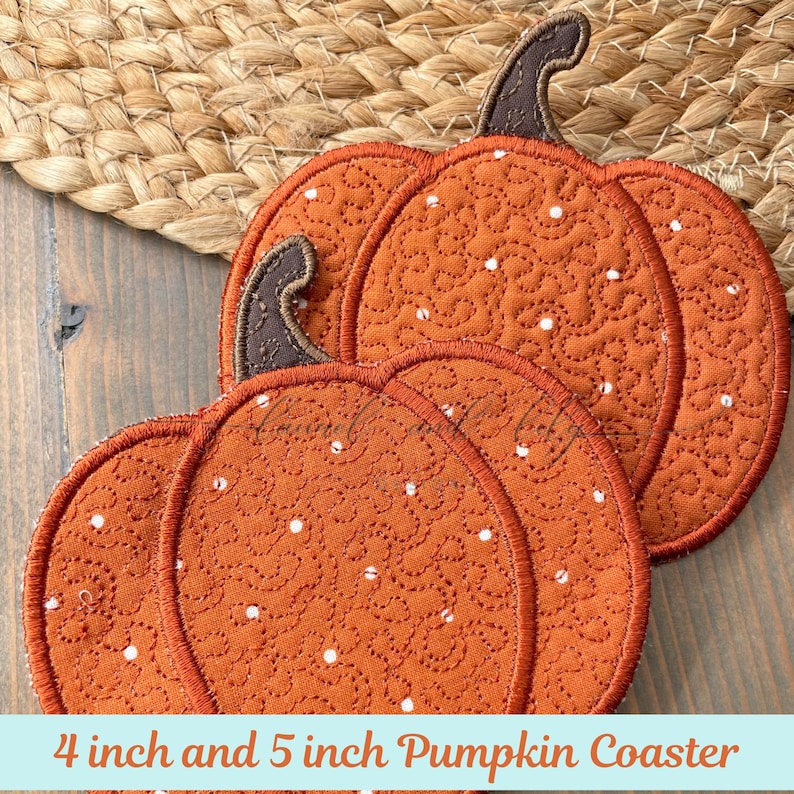 May include: Orange pumpkin-shaped coasters with white polka dots and brown stems. The coasters are 4 and 5 inches in diameter. The coasters are made of a textured fabric and are designed for fall or autumn decor.