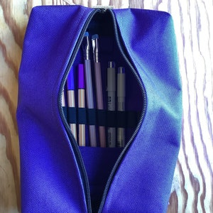 Large Zippered Art Supply Bag. Flat Pencil Case with protective elastic loops and skirt. Heavy Duty, 1000D Cordura, waterproof fabric.