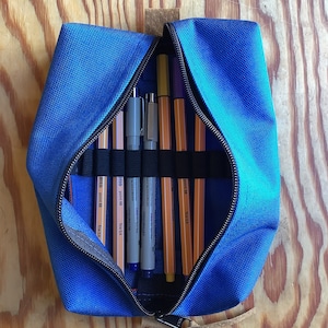 Medium Zippered Art Supply Bag. Flat Pencil Case with protective elastic loops and skirt. Heavy Duty, 1000D Cordura, waterproof fabric.