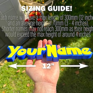 May include: A blue and yellow 3D-printed sign that reads "Your Name" with a 30.48 cm measurement indicator. The text "SIZING GUIDE!" is at the top, with details about the maximum length and height.