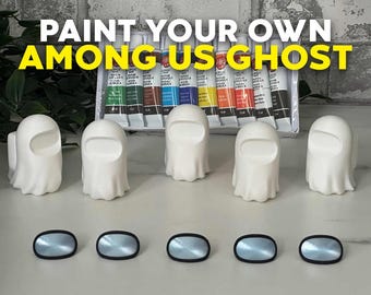 May include: Five white ceramic ghost figurines with black eye holes, ready to be painted. The ghosts are arranged in a row on a gray surface. A set of acrylic paints is visible in the background. The text "PAINT YOUR OWN AMONG US GHOST" is displayed at the top of the image.