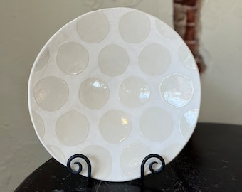 White bowl with clear polka dots
