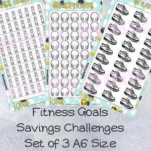 May include: Three A6-sized sticker sheets with black and white illustrations. The first sheet features 36 headphone icons. The second sheet features 36 fitness tracker icons. The third sheet features 36 sneaker icons. The text "Fitness Goals Savings Challenges Set of 3 A6 Size" is printed below the sheets.