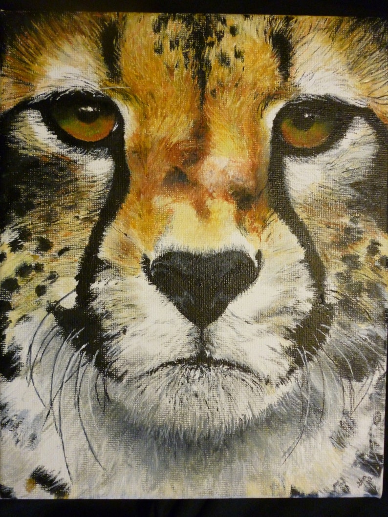 May include: Close-up painting of a cheetah's face. The cheetah has a light brown and black spotted coat. The cheetah's eyes are brown and the nose is black. The cheetah's mouth is closed and the whiskers are visible.