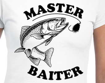 May include: White women's t-shirt with a black graphic of a fish jumping out of the water with a fishing lure. The text "MASTER BAITER" is printed on the shirt.