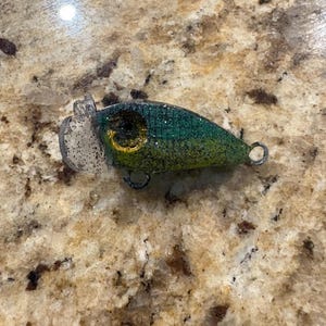 The Jitterbug, classic bass, musky, and pike fishing lure