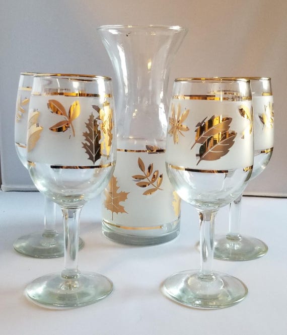 Carafe and 4 wine glass set by Starlyte Inc. with frosted glass and gold  leaves