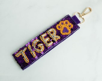 Tiger Paw Purple Yellow 6&quot; Long Keychain, Seed, Sequins Wristlet, Gameday Cheer Flair, Never Lost, LSU NCAA Tigers Collegiate Sports Gift