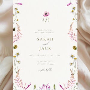 May include: Wedding invitation with a floral border. The invitation reads "S/J Kindly join us for the wedding of Sarah and Jack August 20th at 5 PM 123 Anywhere St. Any City, ST 12345 reception to follow"