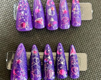 Uñas postizas con diseño de estrella fugaz térmica morada