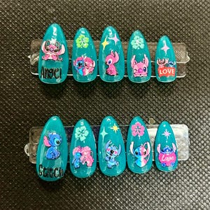 teal glow Stitch and Angel press on nails