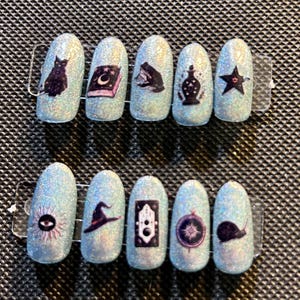 unghie finte olografiche nere magiche