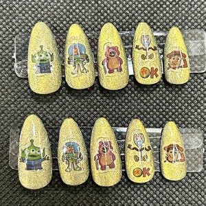 3D green gold cat eye Toy Story press on nails