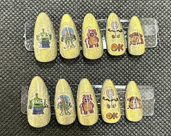 gold cat eye Toy Story press on nails