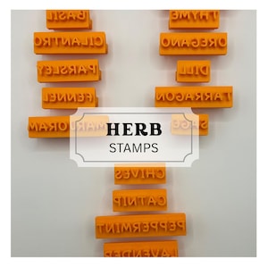 May include: A collection of orange rectangular herb stamps arranged in a vertical pattern. Each stamp features raised lettering for specific herbs including basil, thyme, cilantro, oregano, parsley, dill, fennel, tarragon, marjoram, sage, chives, catnip, peppermint, and lavender.